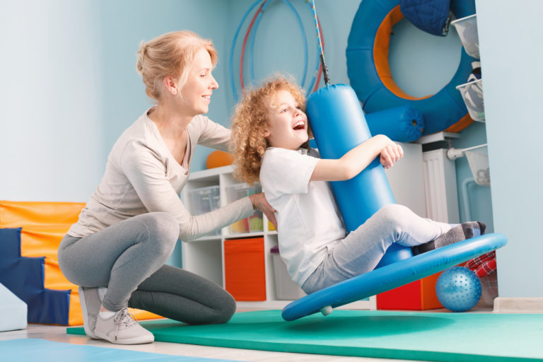 Child doing balance exercises – LifeTown Registry